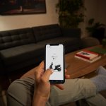 Checking EV charging using a smartphone app.