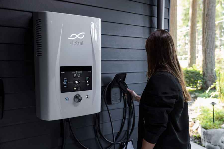 Girl holding a smart EV charger.