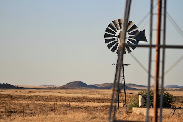 Wind turbine in a field.